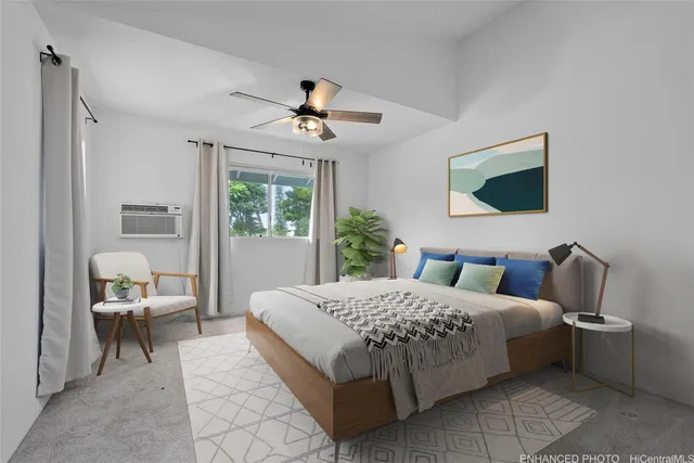 a bedroom with a large bed and a flat screen tv