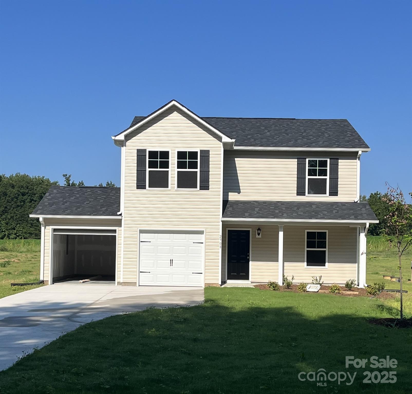 2908 Tysinger Road Denton, NC 27239 - Photo 1 of 3 a front view of a house with a yard