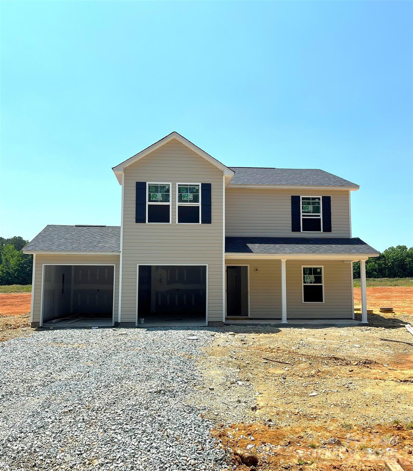 2908 Tysinger Road Denton, NC 27239 - Photo 2 of 3 a front view of a house with a yard