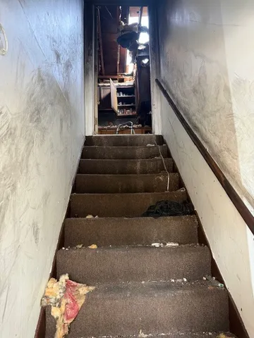 a view of a dinning table in backyard of the house