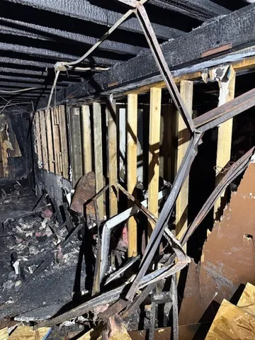 a bathroom with a glass door shower