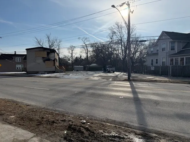 a view of a building with a street