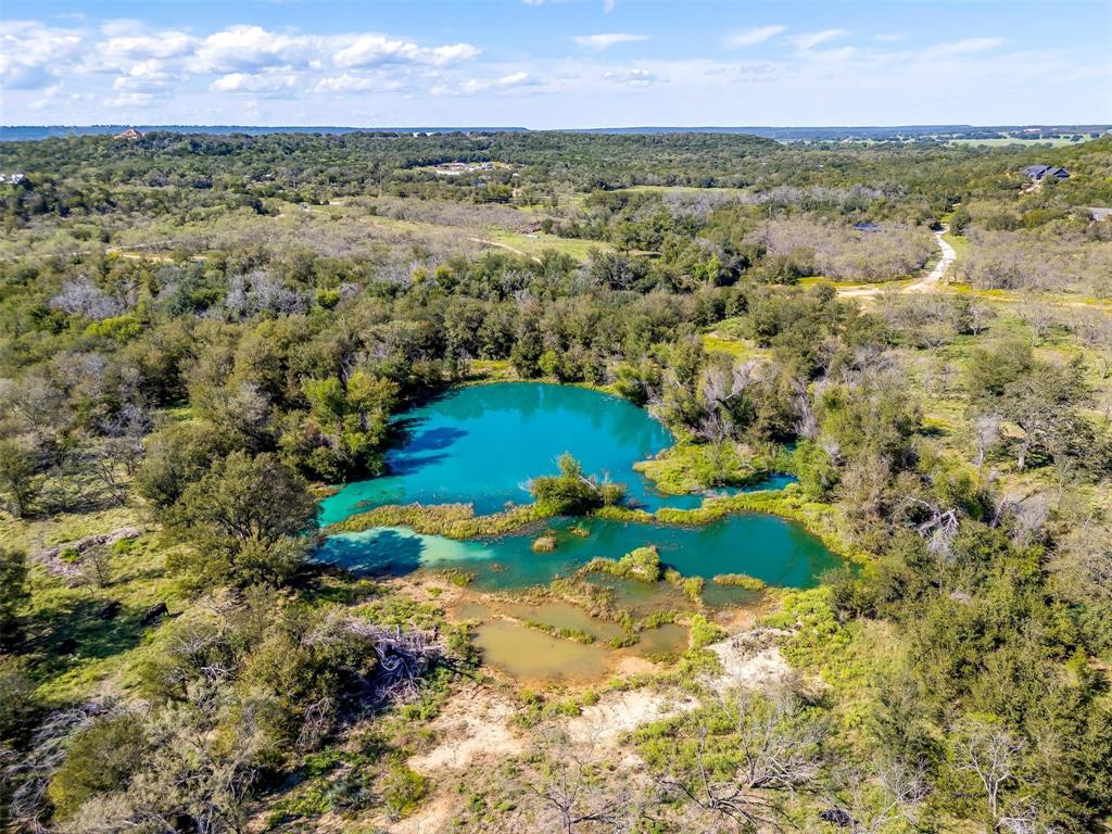 901 Remington Road Santo, TX 76472 - Photo 23 of 40 a view of a lake with a city