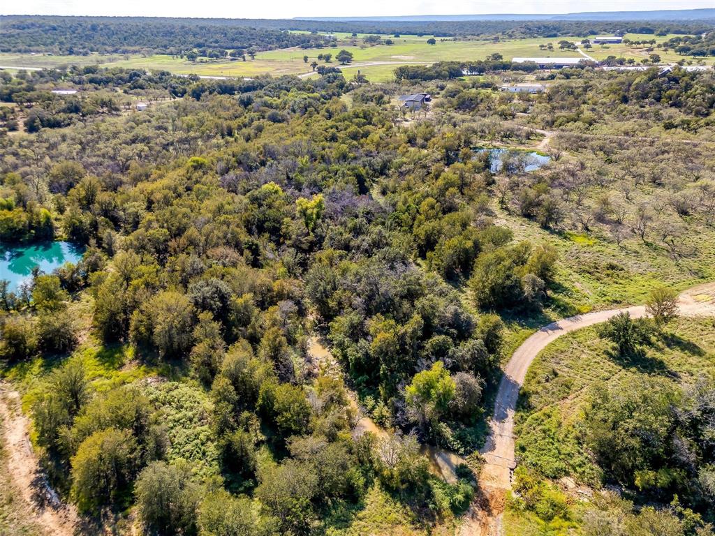 901 Remington Road Santo, TX 76472 - Photo 27 of 40 an aerial view of a houses