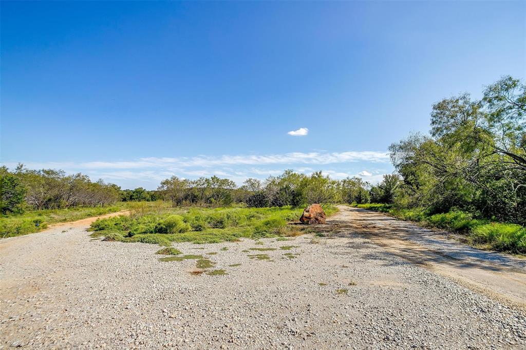 901 Remington Road Santo, TX 76472 - Photo 8 of 40 a view of a road with an ocean view