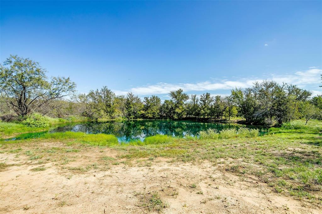 901 Remington Road Santo, TX 76472 - Photo 9 of 40 a view of lake with green space