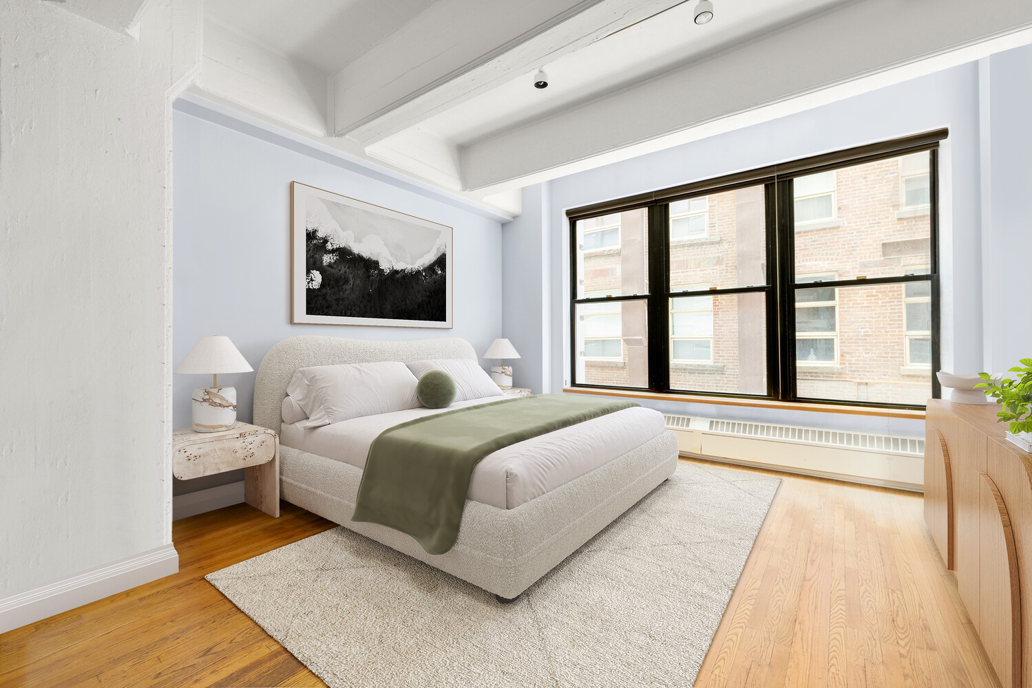 30 Main Street, Unit 3F Brooklyn, NY 11201 - Photo 3 of 12 a bedroom with a large bed and a large window