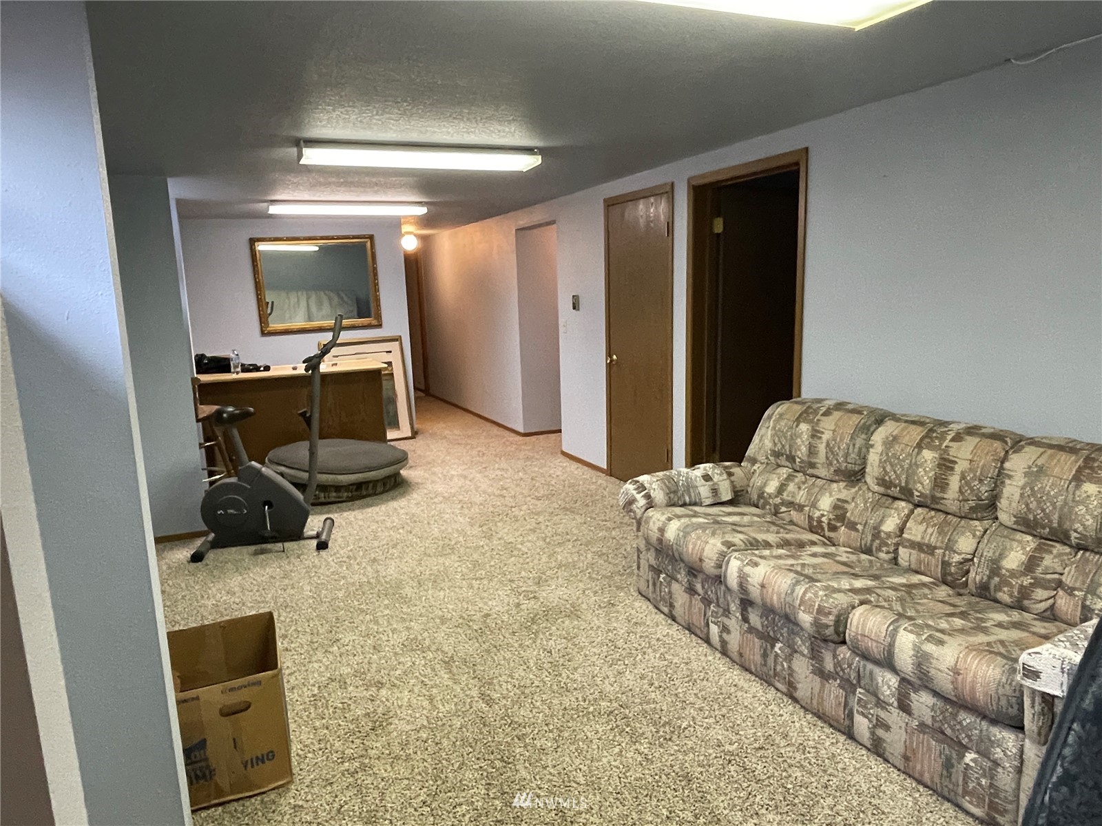 1803 East Tokio Road Ritzville, WA 99169 - Photo 18 of 35 a bedroom with a bed a couch and dresser
