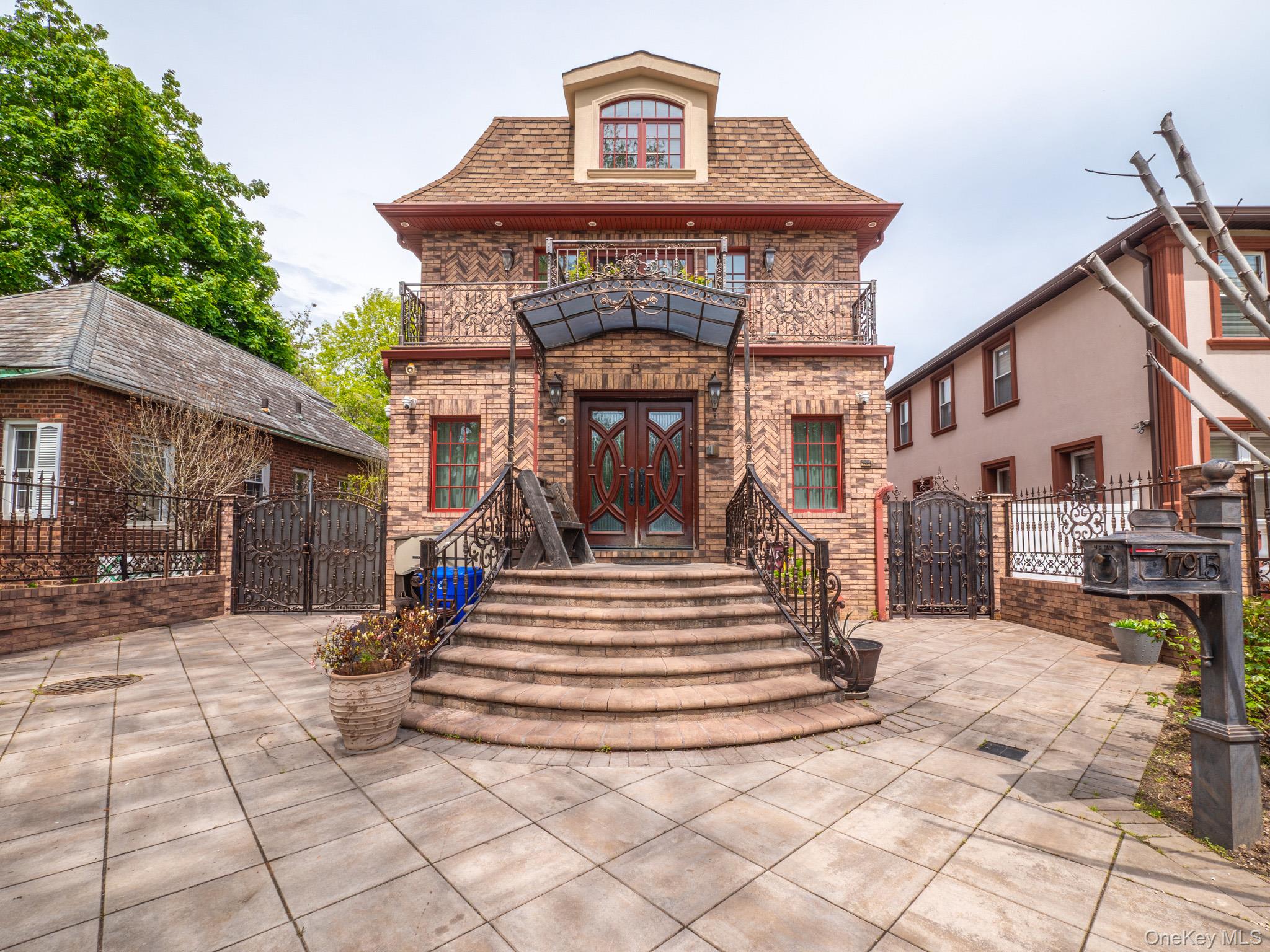 179-15 80th Road Queens, NY 11366 - Photo 11 of 35 a view of a building with a outdoor space