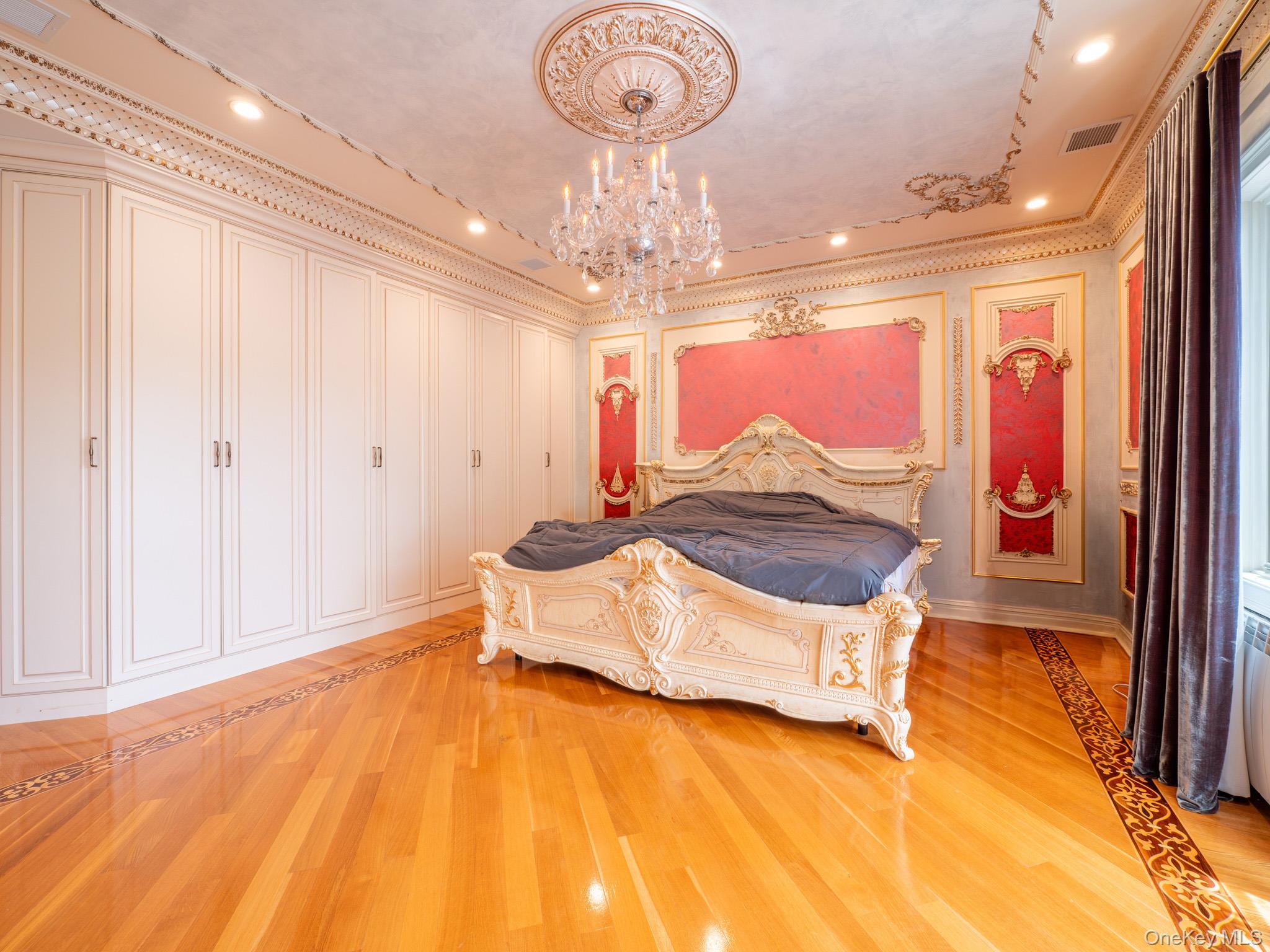 179-15 80th Road Queens, NY 11366 - Photo 14 of 35 a spacious bedroom with a bed dresser and a window