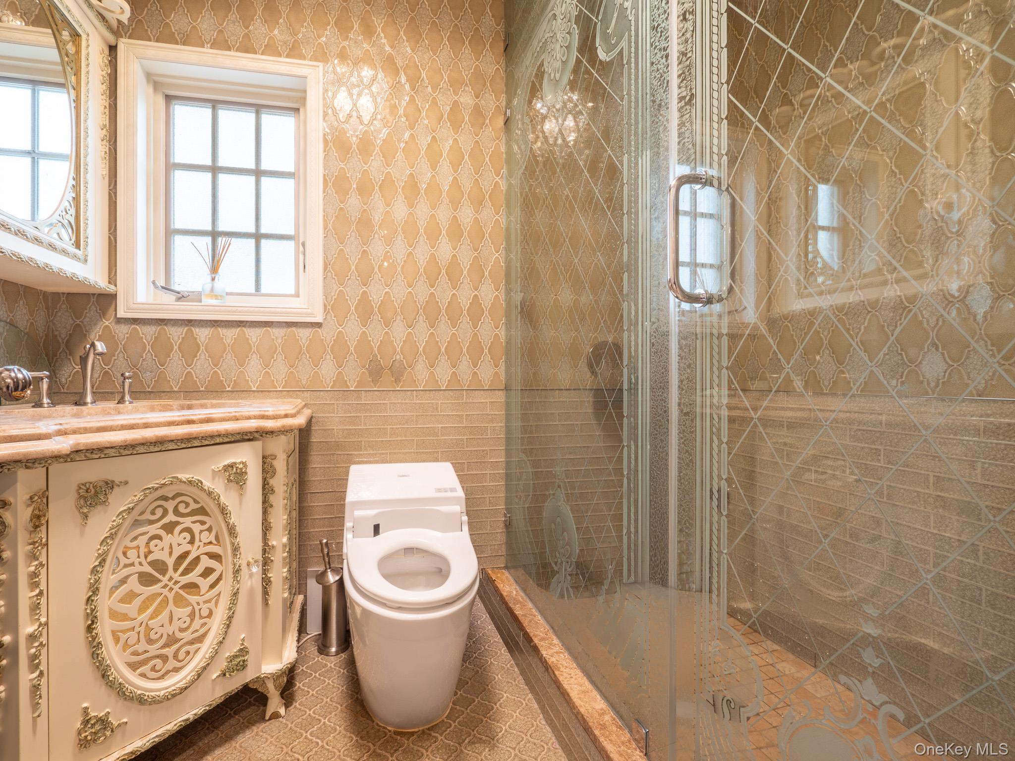 179-15 80th Road Queens, NY 11366 - Photo 15 of 35 a bathroom with a toilet sink and shower