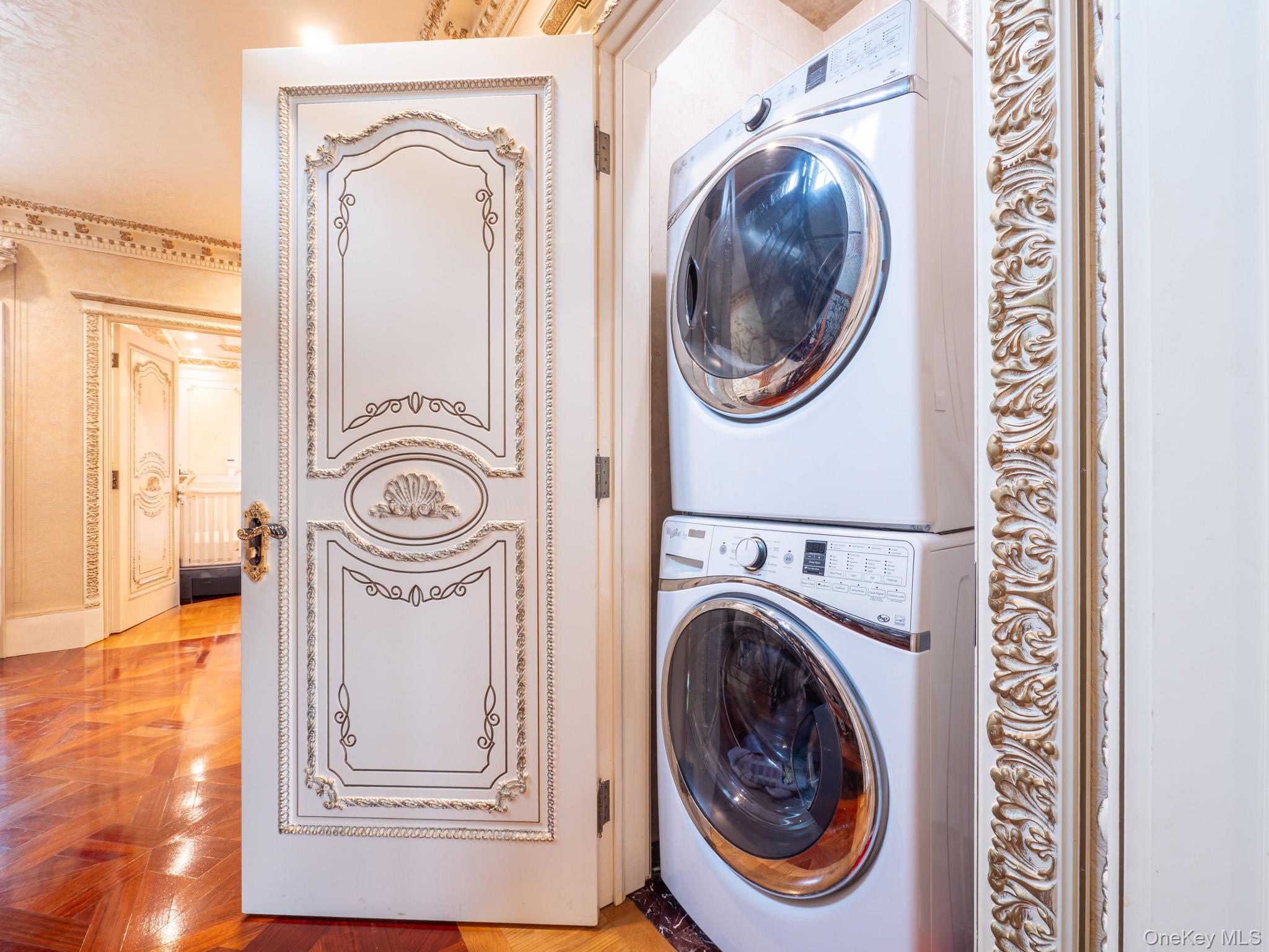 179-15 80th Road Queens, NY 11366 - Photo 20 of 35 a view of a hallway with washer and dryer