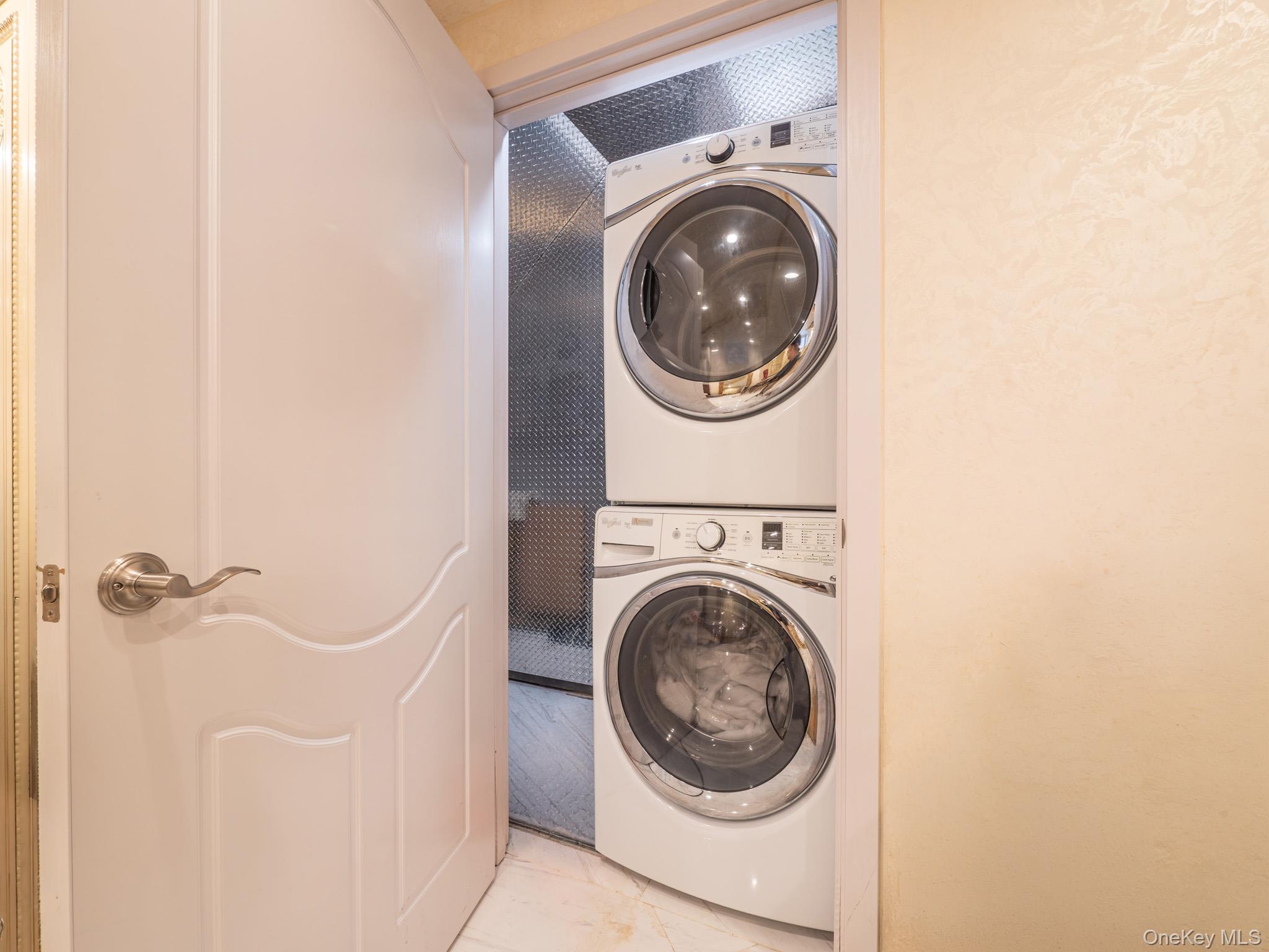 179-15 80th Road Queens, NY 11366 - Photo 27 of 35 a utility room with dryer and washer