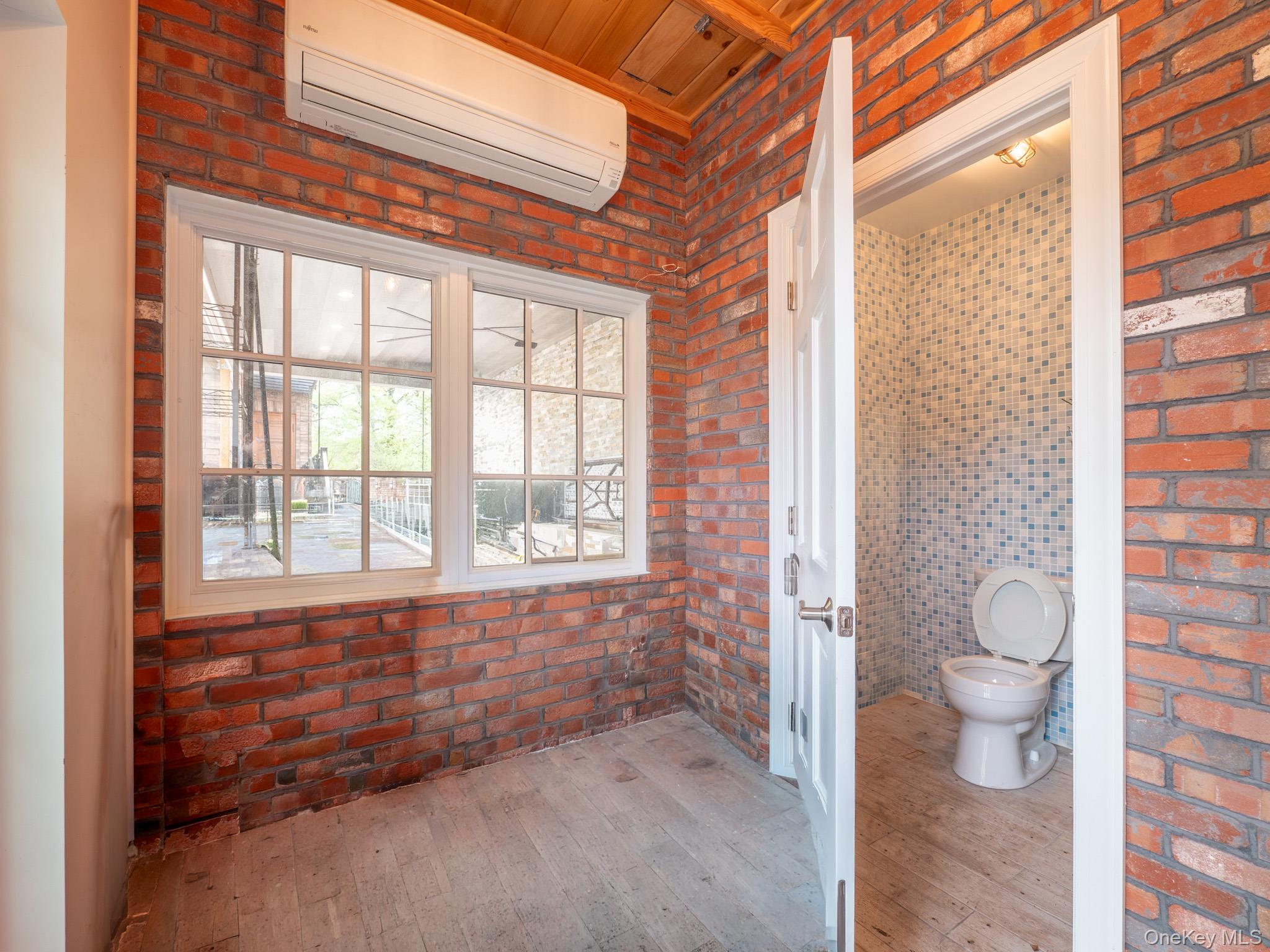 179-15 80th Road Queens, NY 11366 - Photo 34 of 35 a bathroom with a toilet