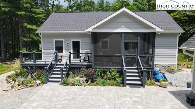 a house with trees in front of it