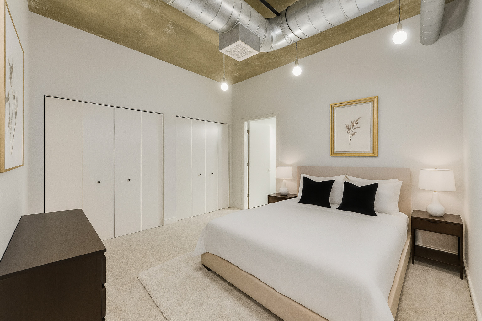 111 South Morgan Street, Unit 510 Chicago, IL 60607 - Photo 4 of 38 a bedroom with a bed and a painting on the wall