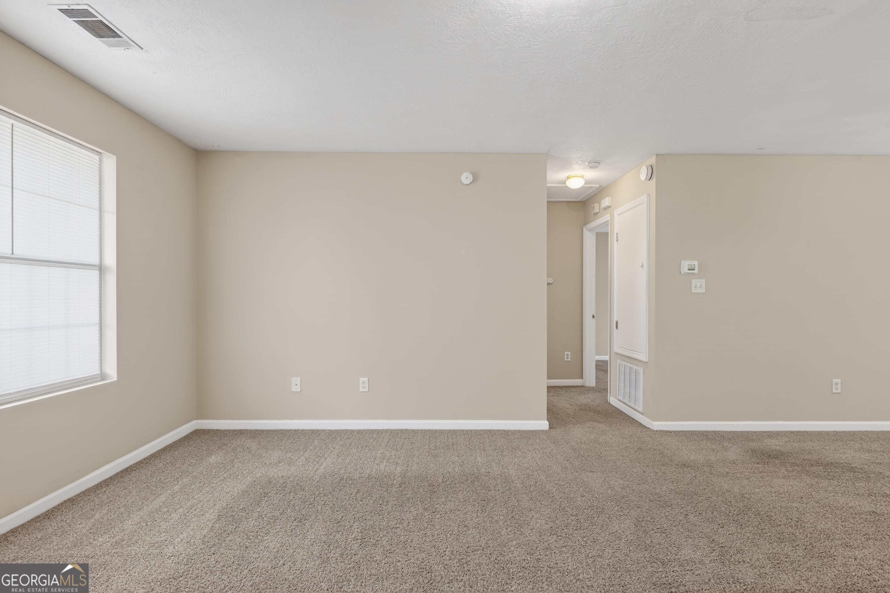 2902 Rasha Drive Augusta, GA 30906 - Photo 13 of 31 a view of an empty room with a window