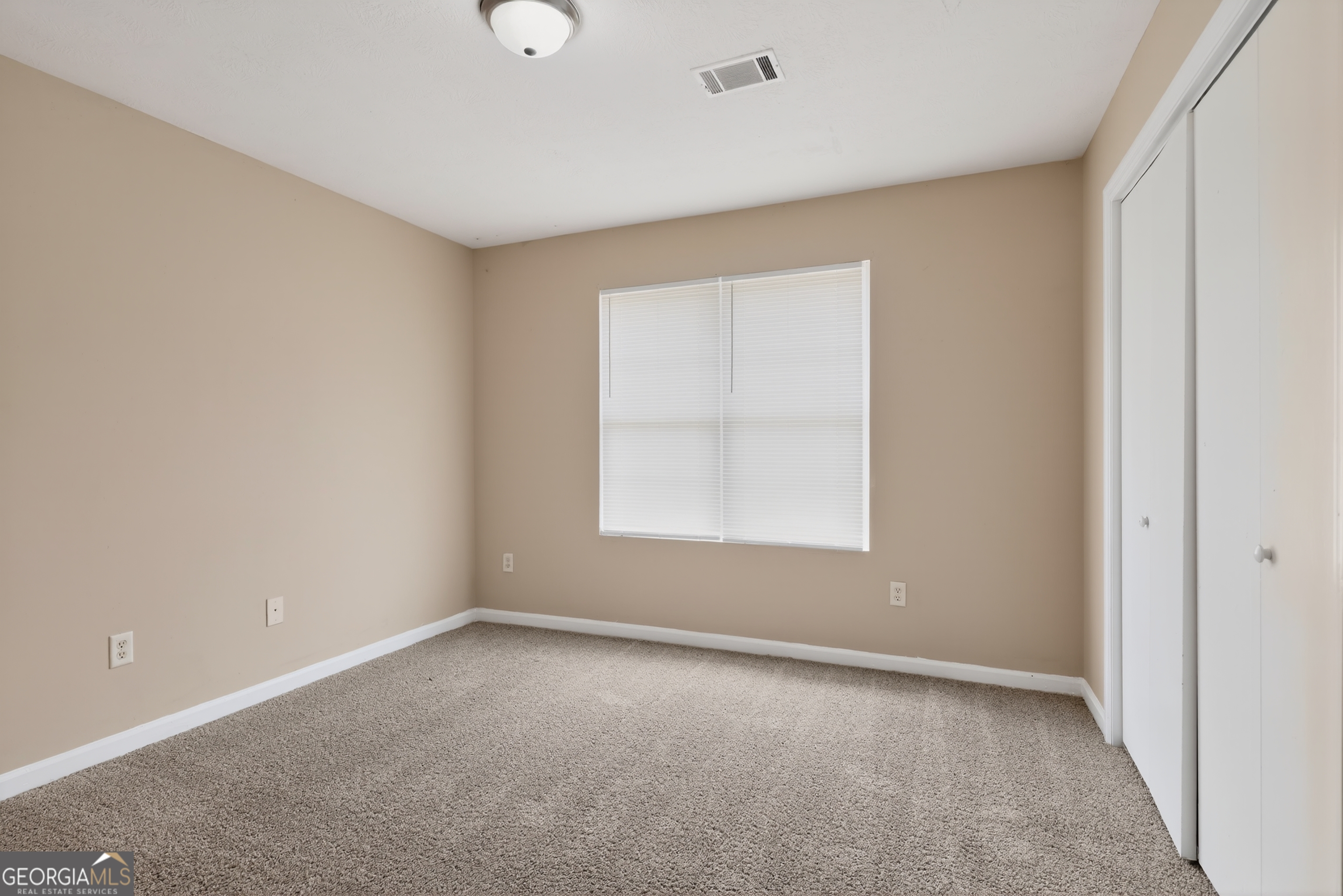 2902 Rasha Drive Augusta, GA 30906 - Photo 23 of 31 an empty room with a window