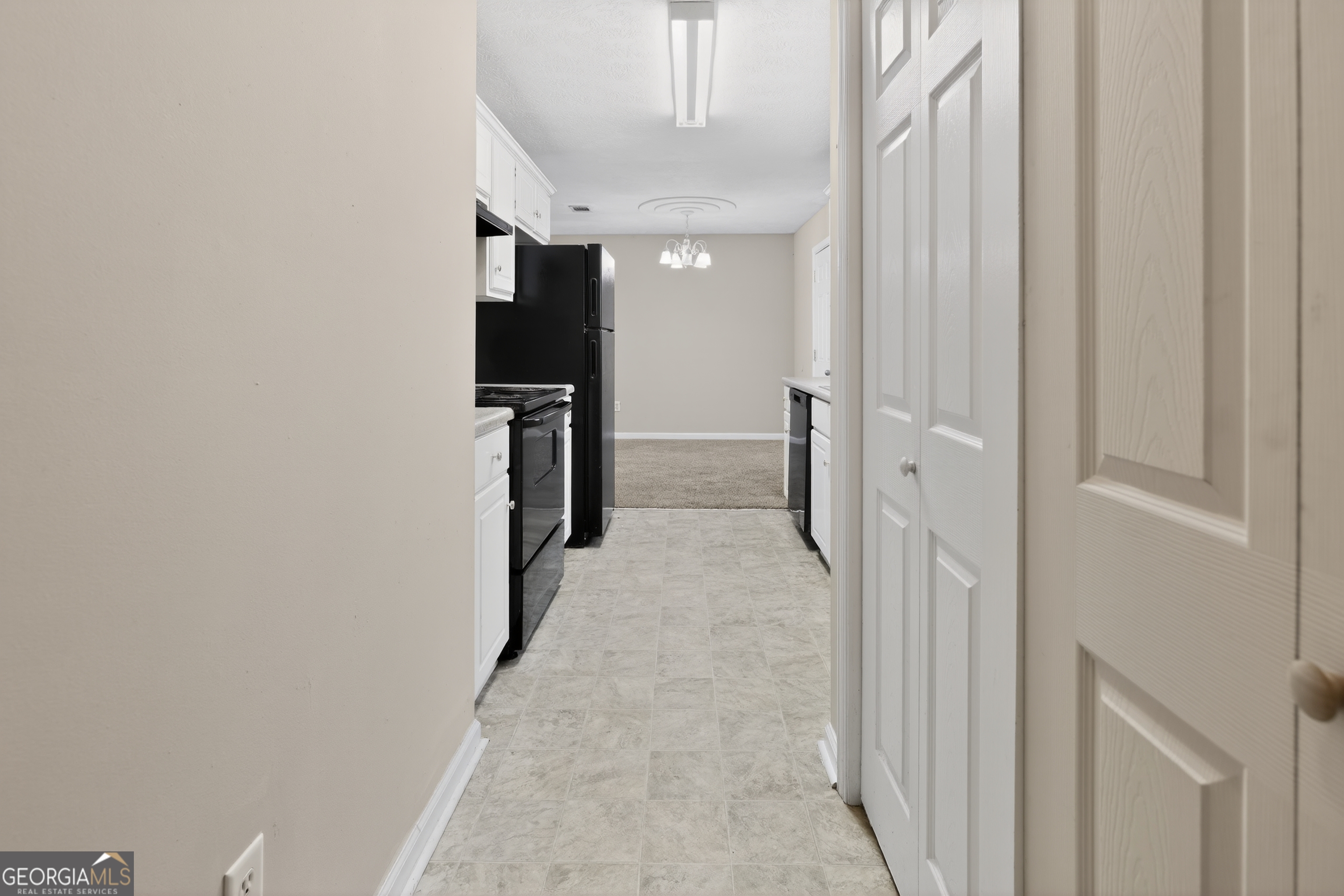 2902 Rasha Drive Augusta, GA 30906 - Photo 28 of 31 a view of a hallway with wooden shelves