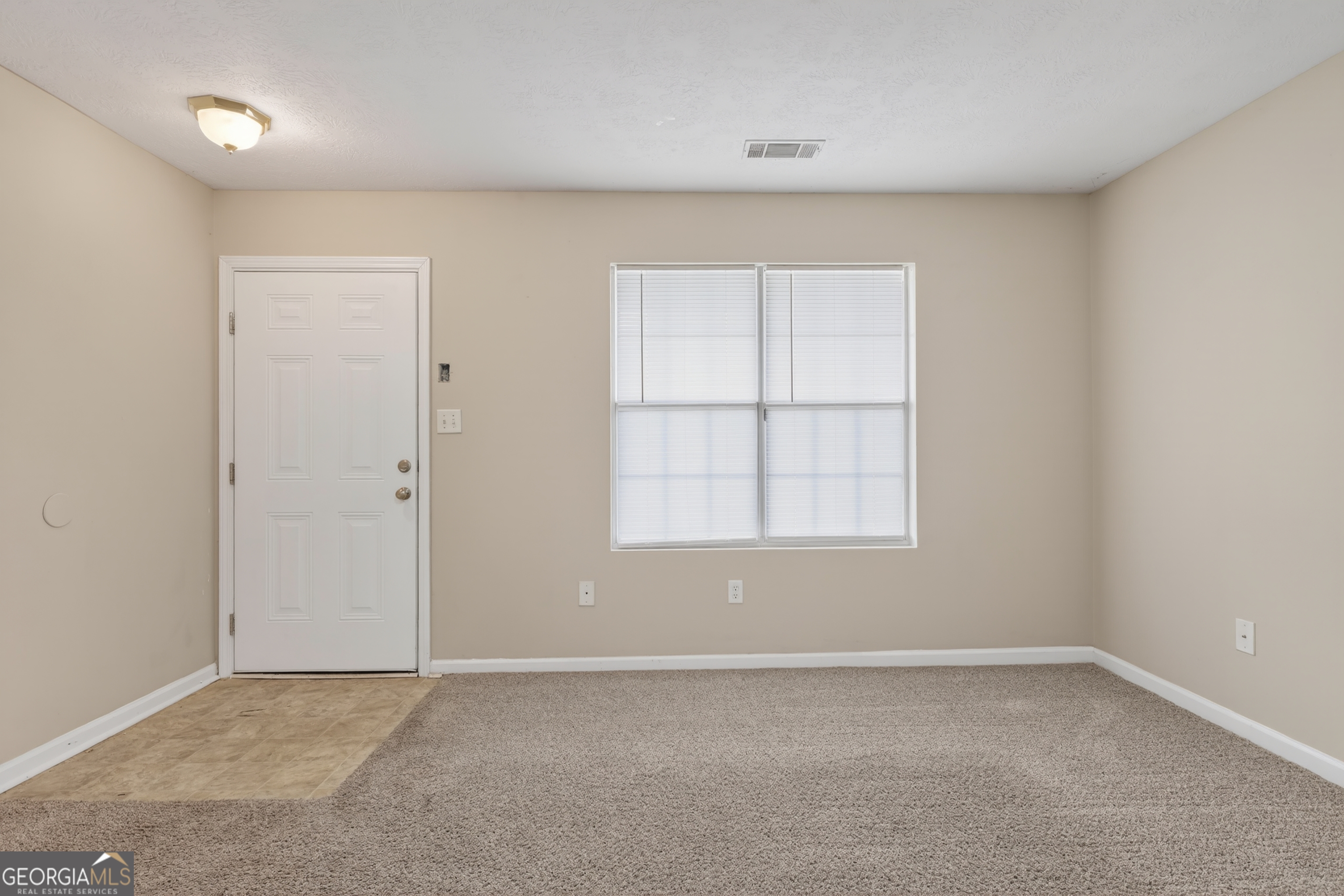 2902 Rasha Drive Augusta, GA 30906 - Photo 9 of 31 an empty room with a window