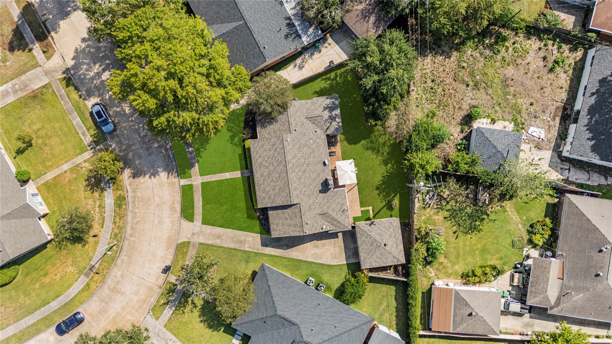 6031 McKnight Street Houston, TX 77035 - Photo 36 of 37 an aerial view of a house with a yard