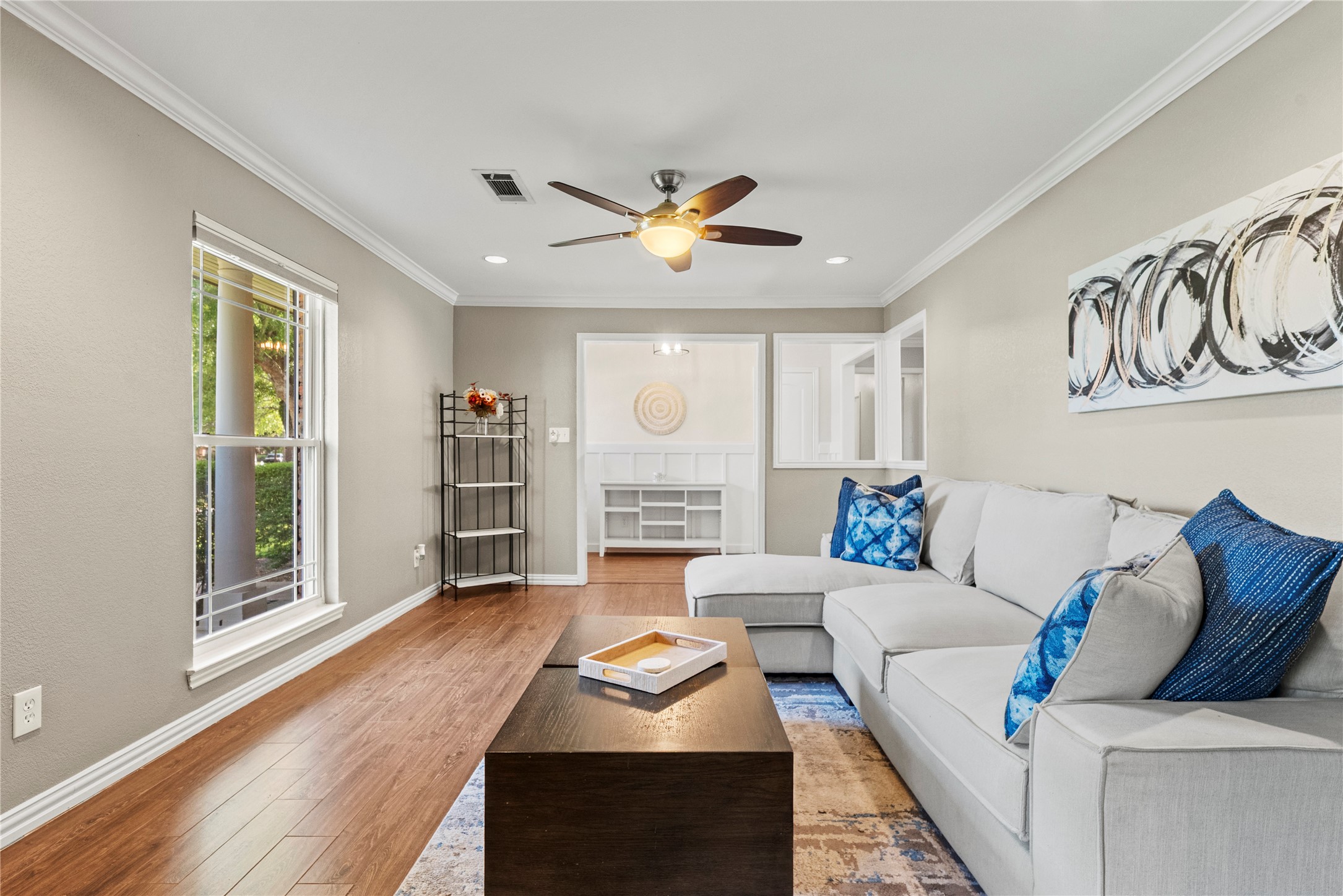 6031 McKnight Street Houston, TX 77035 - Photo 8 of 37 a living room with furniture and a window