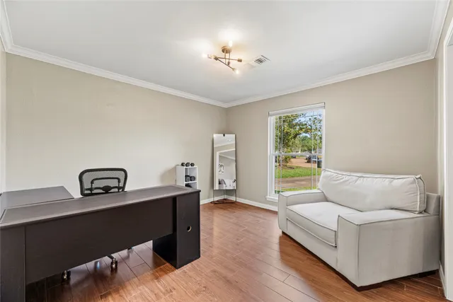 a living room with furniture and window