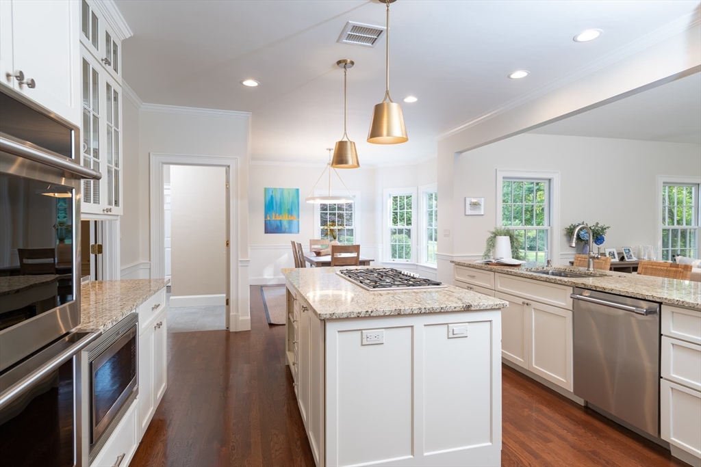 46 Concord Road Weston, MA 02493 - Photo 11 of 42 a kitchen with a sink stove and refrigerator