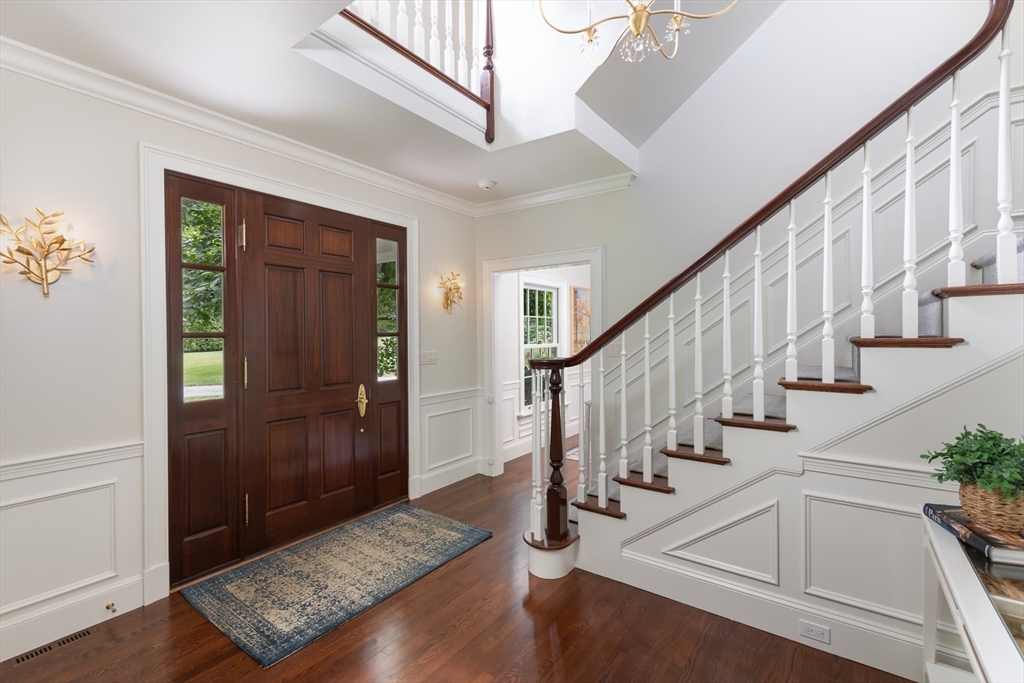 46 Concord Road Weston, MA 02493 - Photo 20 of 42 a view of entryway and hall with wooden floor