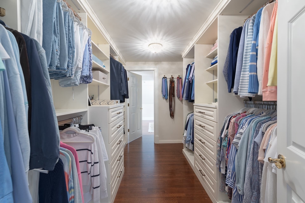 46 Concord Road Weston, MA 02493 - Photo 24 of 42 a view of walk in closet with clothes and shoes