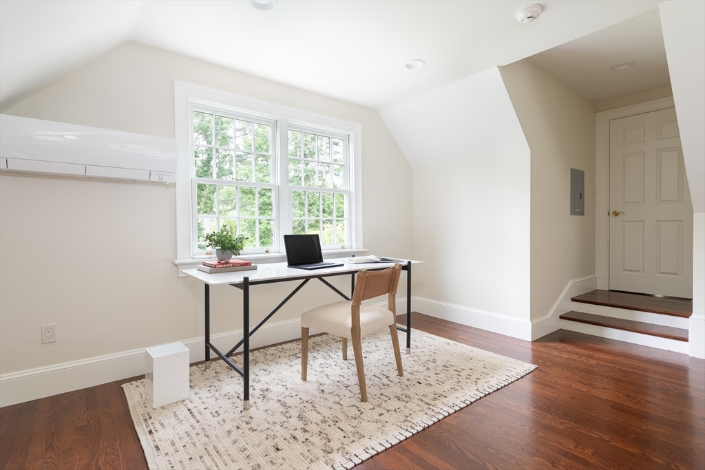 46 Concord Road Weston, MA 02493 - Photo 26 of 42 a workspace with furniture and a window