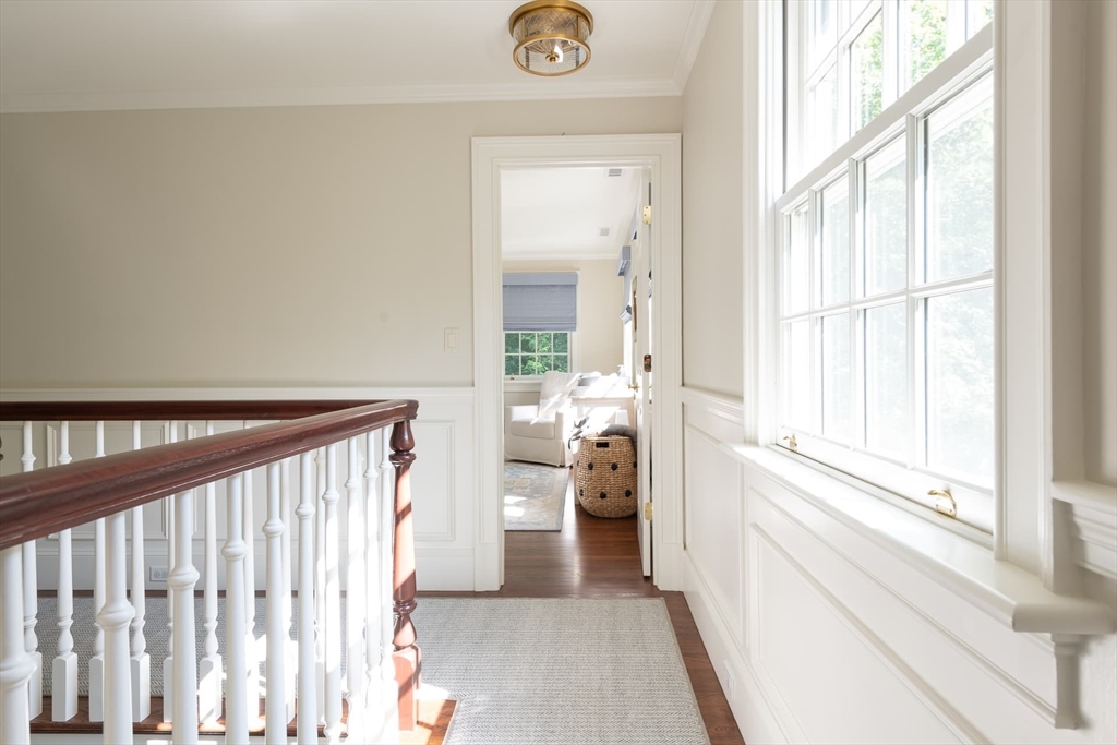 46 Concord Road Weston, MA 02493 - Photo 29 of 42 a view of a hallway view with wooden floor and a window