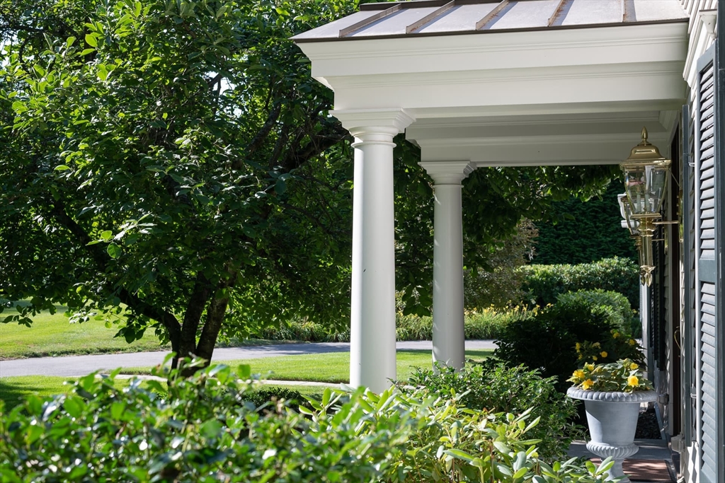 46 Concord Road Weston, MA 02493 - Photo 3 of 42 a house with a yard