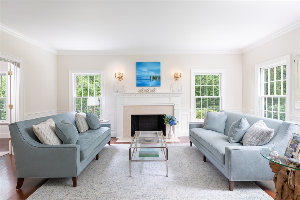 46 Concord Road Weston, MA 02493 - Photo 5 of 42 a living room with furniture and a fireplace