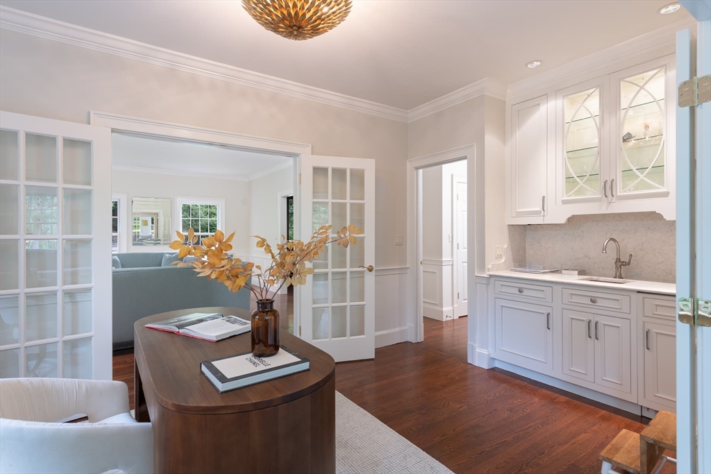 46 Concord Road Weston, MA 02493 - Photo 6 of 42 a living room with furniture a fireplace and a window