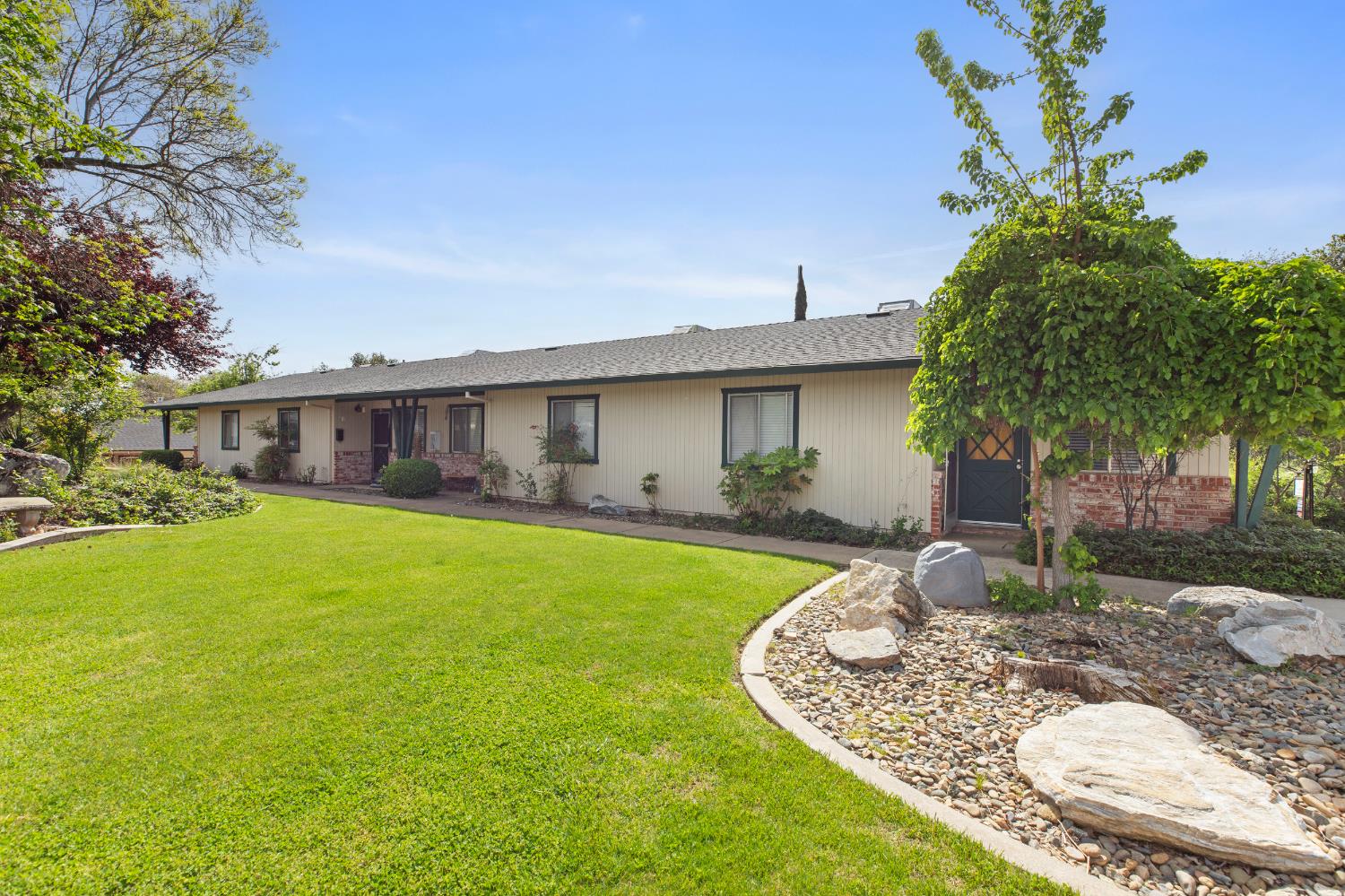91 Summit Avenue Sonora, CA 95370 - Photo 28 of 53 a front view of a house with garden