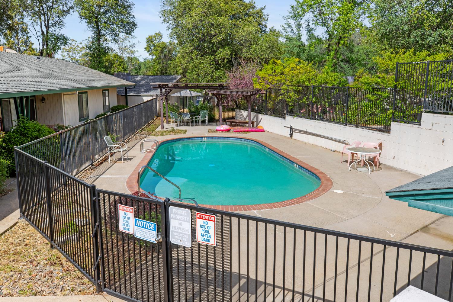 91 Summit Avenue Sonora, CA 95370 - Photo 31 of 53 a view of a balcony with two chairs and a table