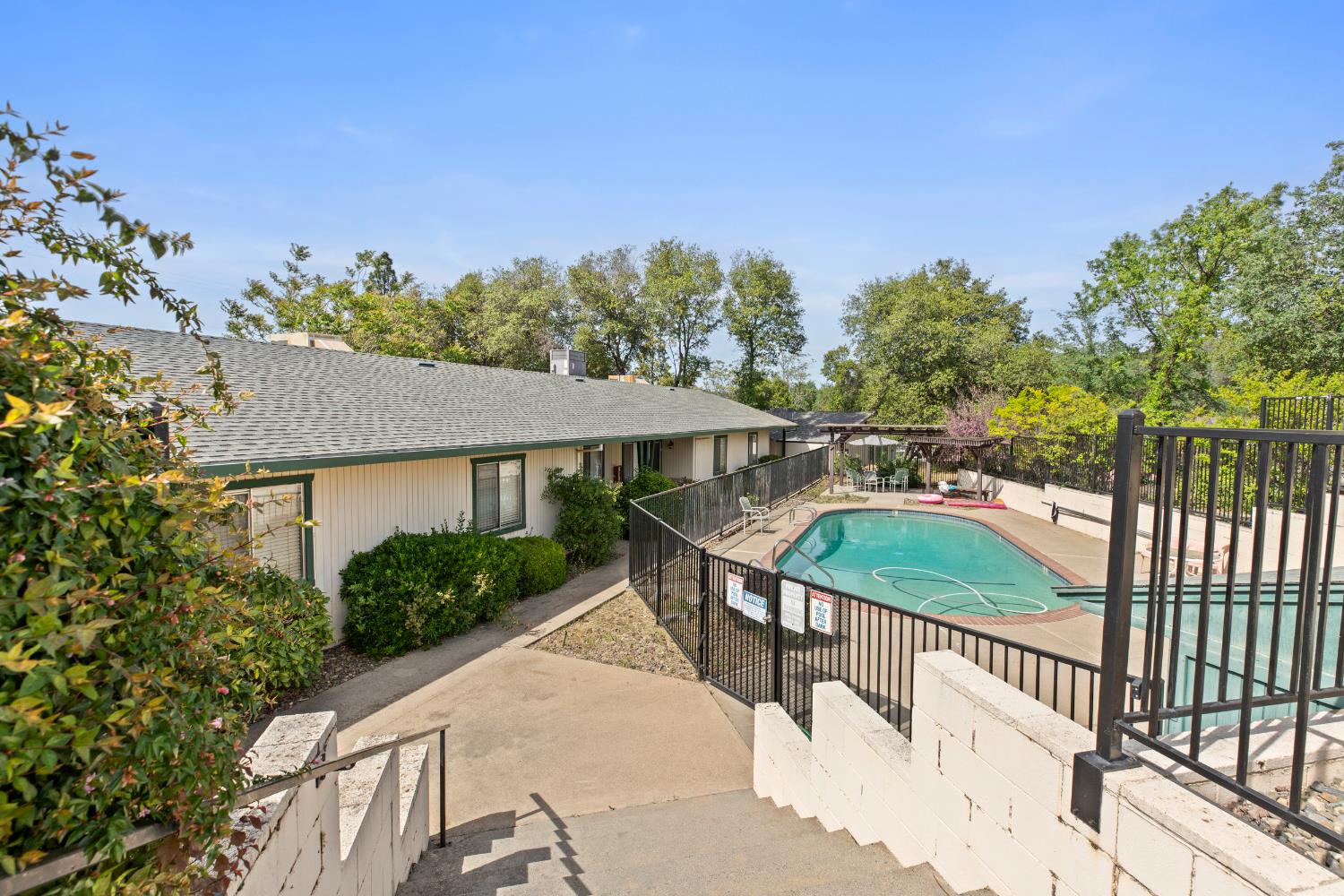 91 Summit Avenue Sonora, CA 95370 - Photo 35 of 53 a view of a roof deck with wooden fence and floor