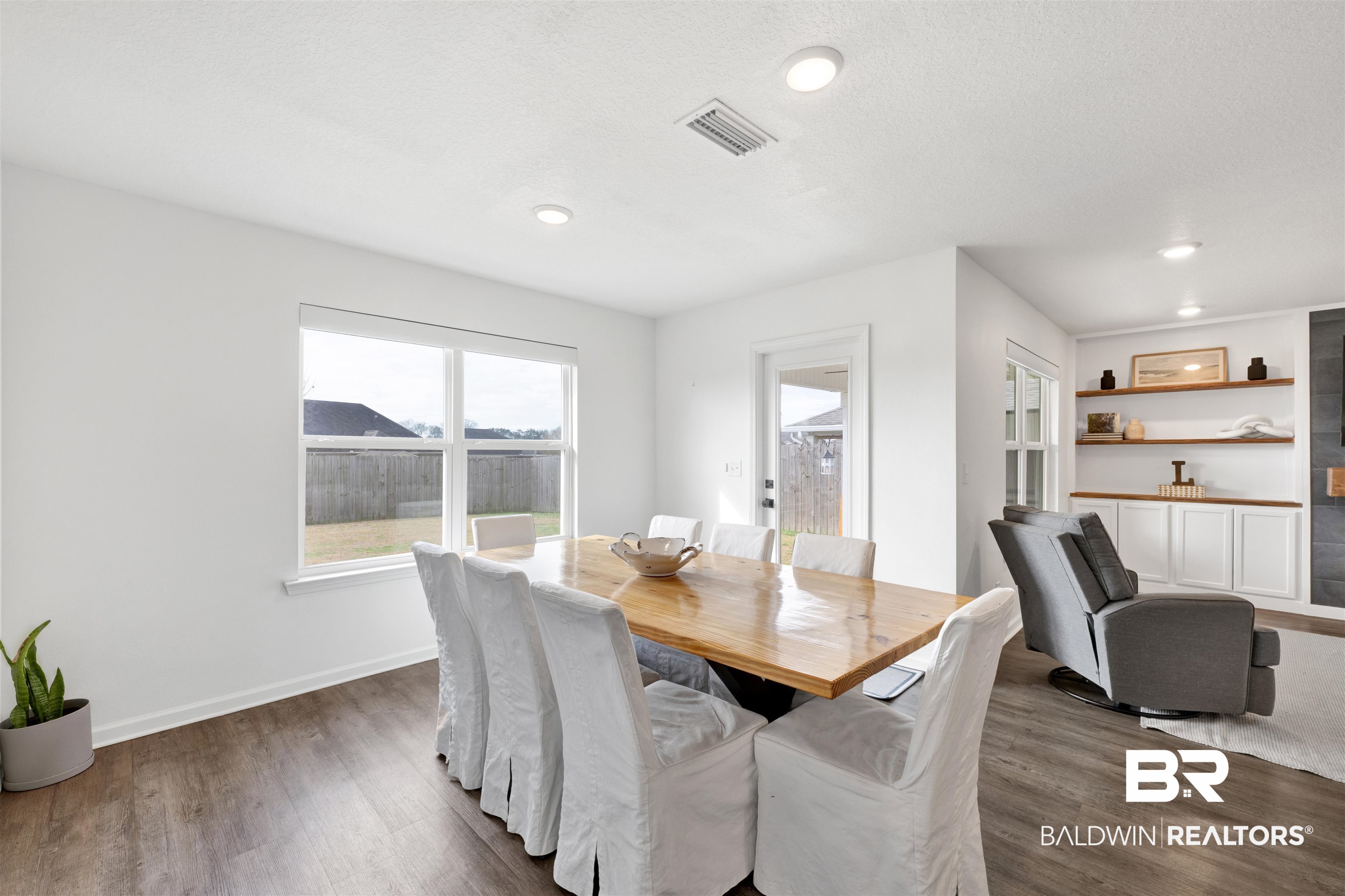 10763 Paget Drive North Mobile, AL 36608 - Photo 7 of 24 Dining space featuring dark wood-type flooring and recessed lighting