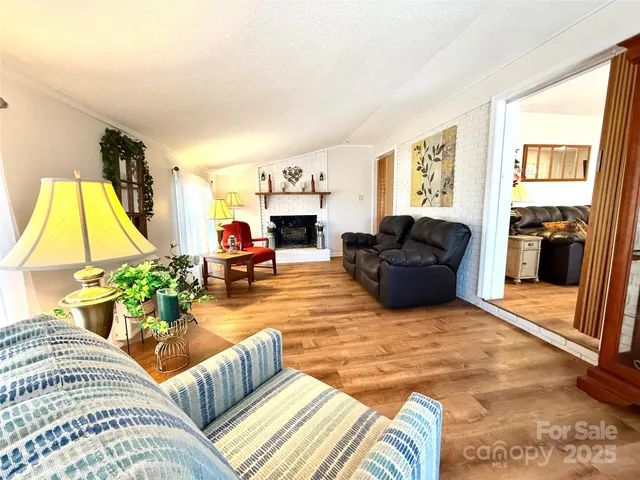 a living room with furniture or couch and a window