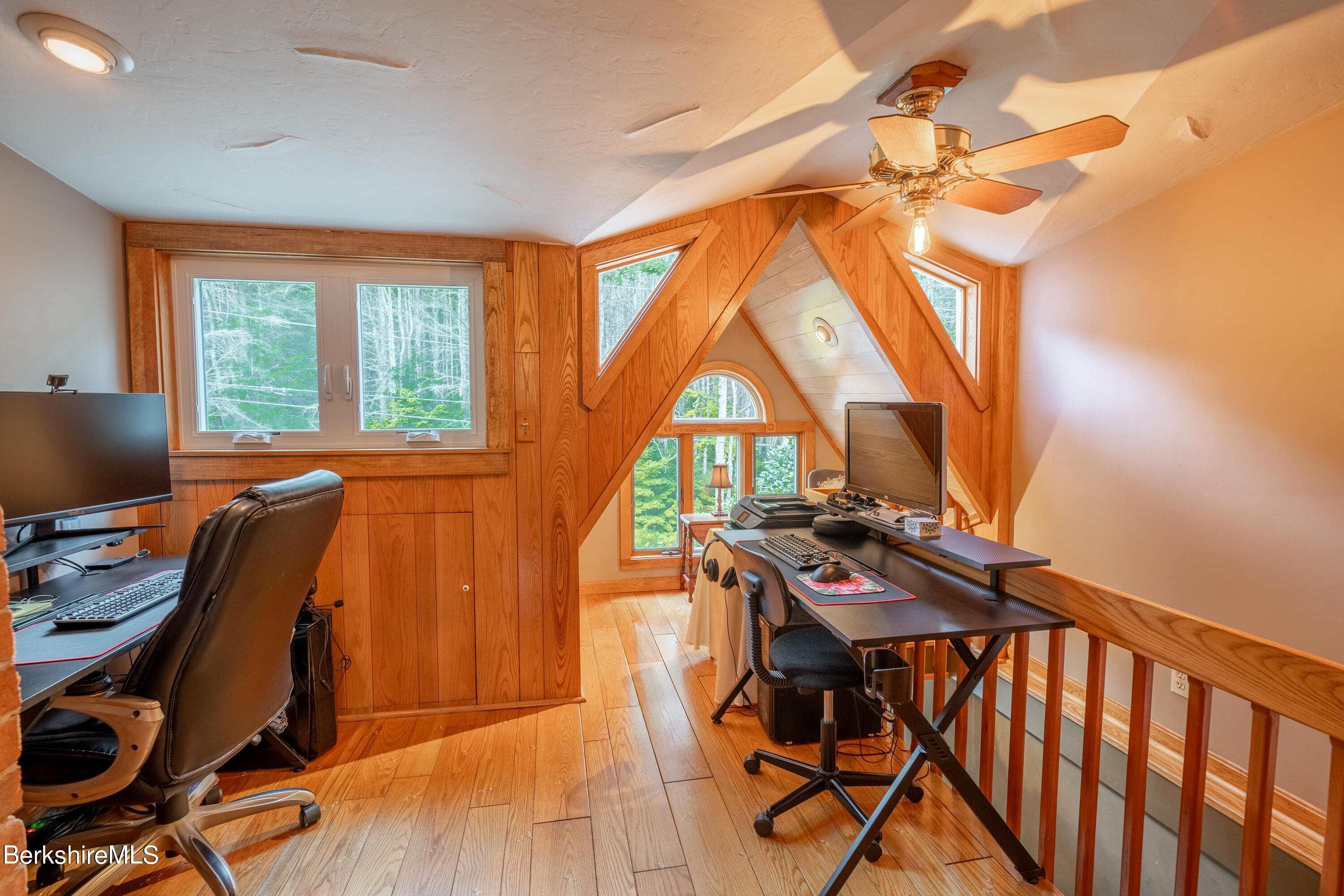 135 Ed Jones Road Otis, MA 01253 - Photo 35 of 45 a view of a workspace with furniture and a window