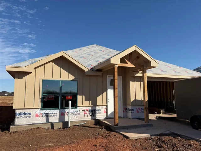 a front view of a house with a porch