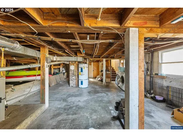 a view of a room with wooden walls
