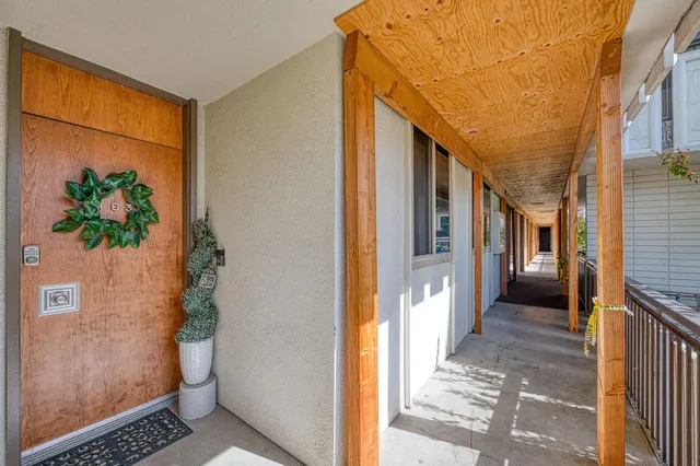 a view of a city from a hallway