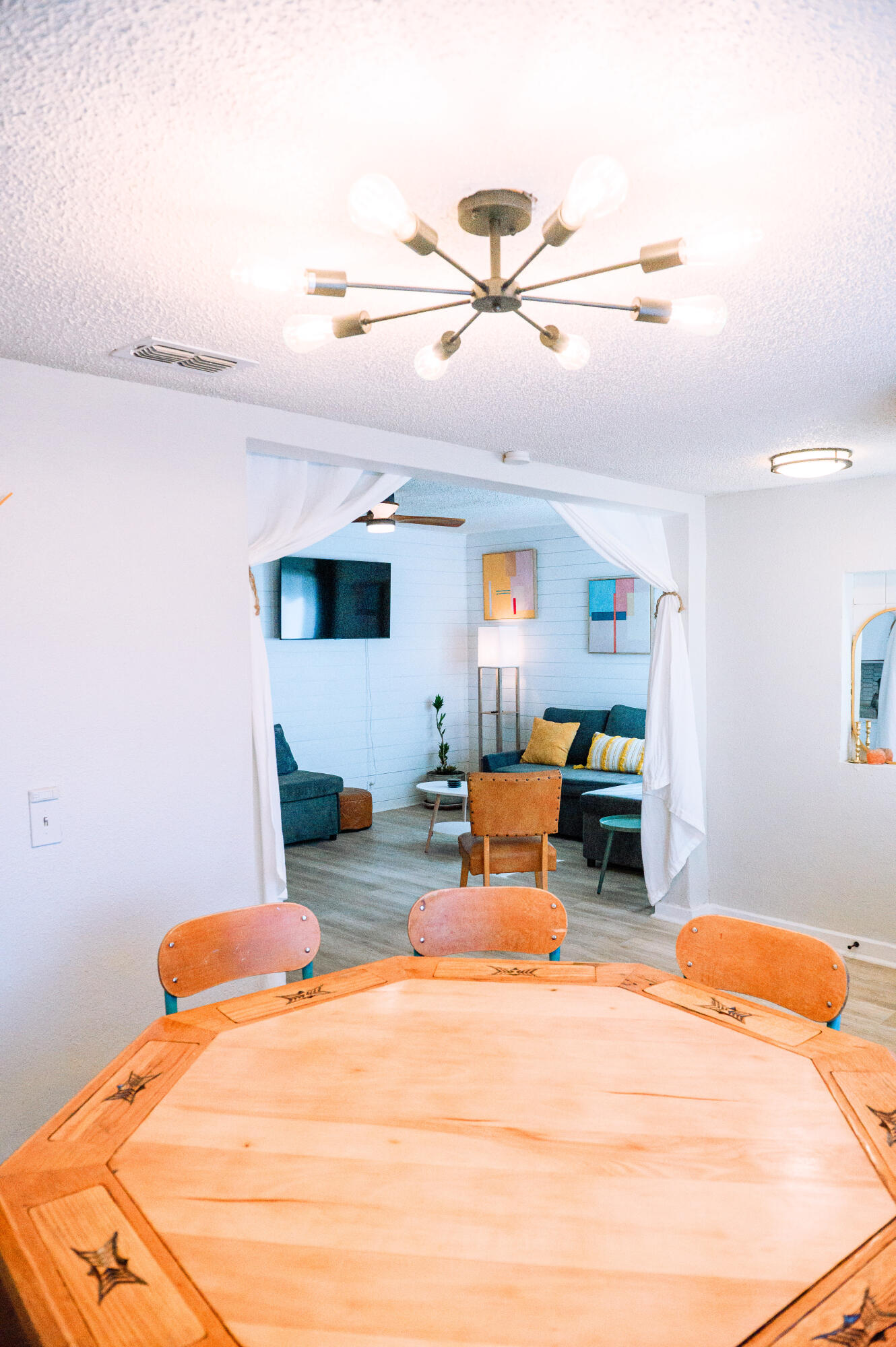 2436 24th Street Lubbock, TX 79411 - Photo 20 of 29 a bedroom with a bed and ceiling fan