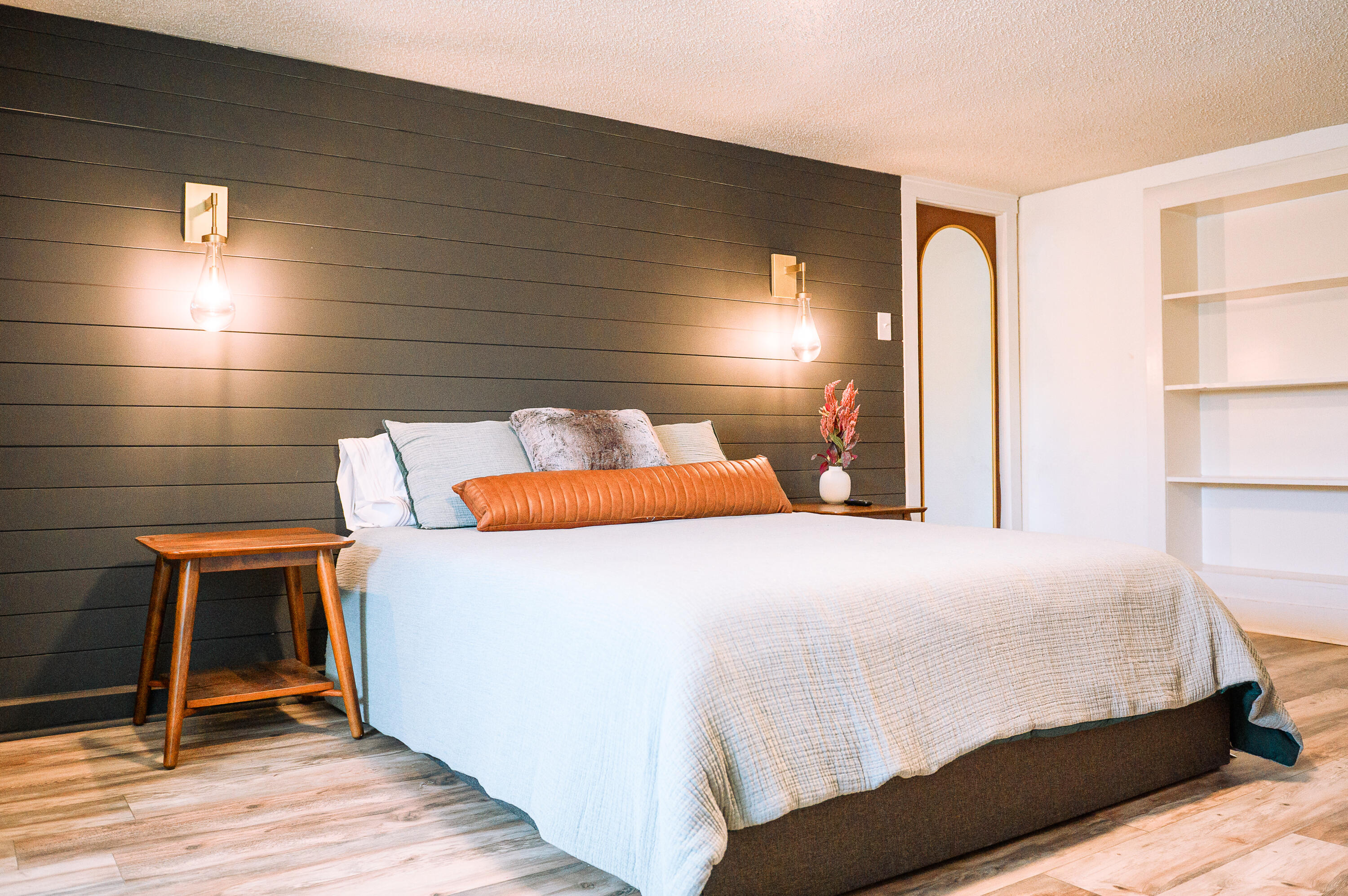 2436 24th Street Lubbock, TX 79411 - Photo 24 of 29 a bedroom with a bed and a mirror