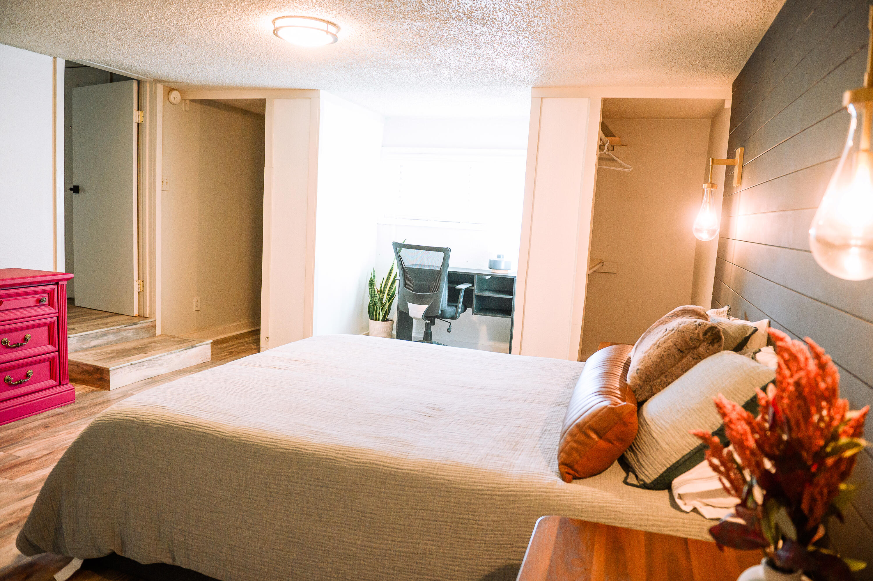 2436 24th Street Lubbock, TX 79411 - Photo 25 of 29 a bedroom with a bed and a window