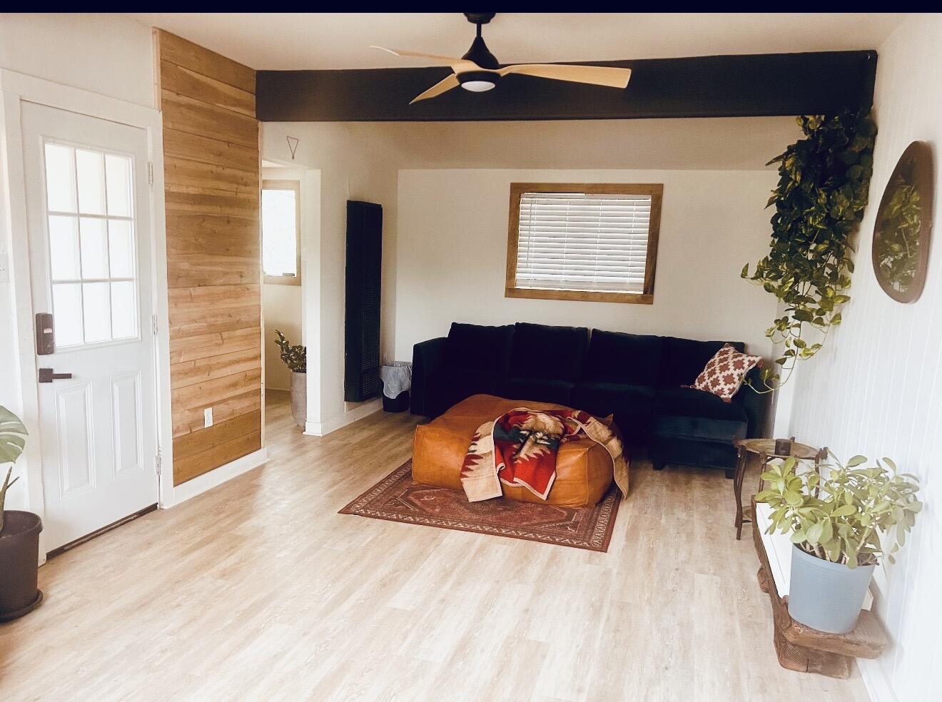 2436 24th Street Lubbock, TX 79411 - Photo 26 of 29 a living room with furniture and a fireplace