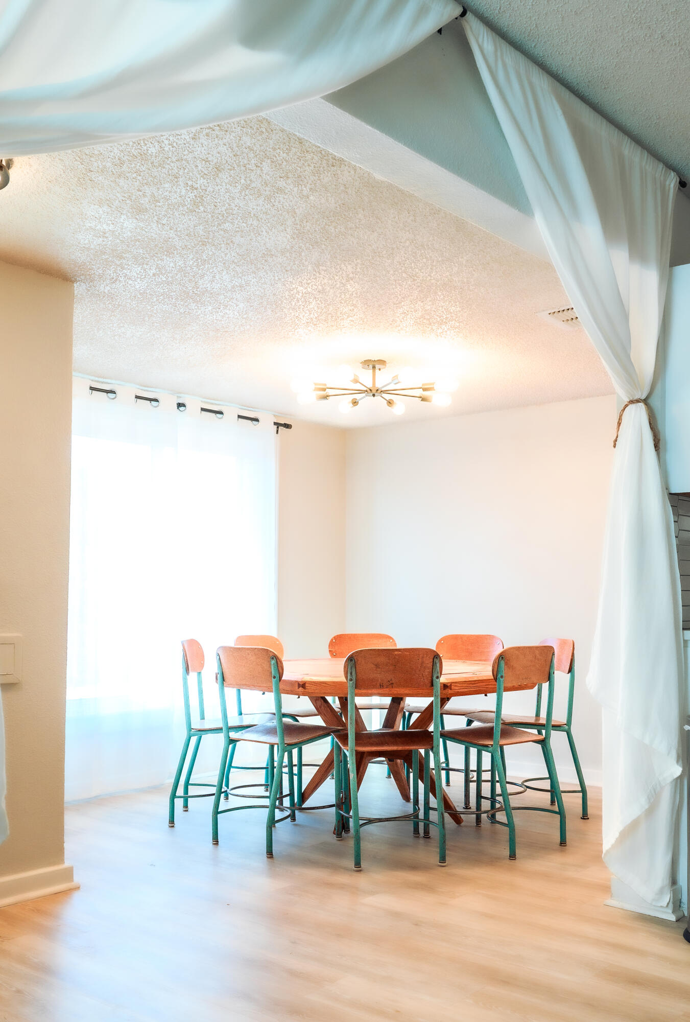 2436 24th Street Lubbock, TX 79411 - Photo 7 of 29 a dining room with furniture and wooden floor