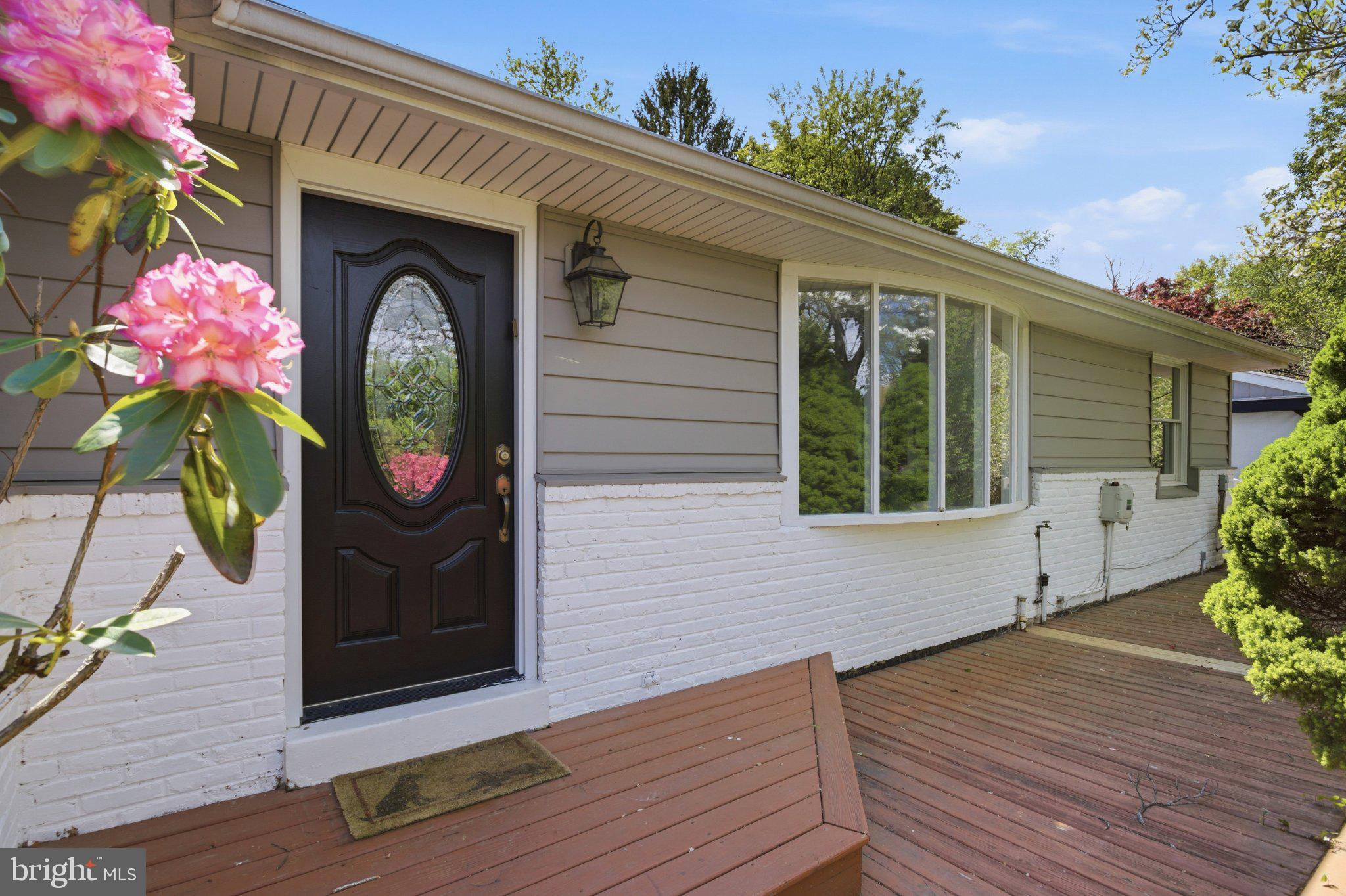 3104 North Providence Road Media, PA 19063 - Photo 1 of 47 Charming entryway with vibrant blooms.